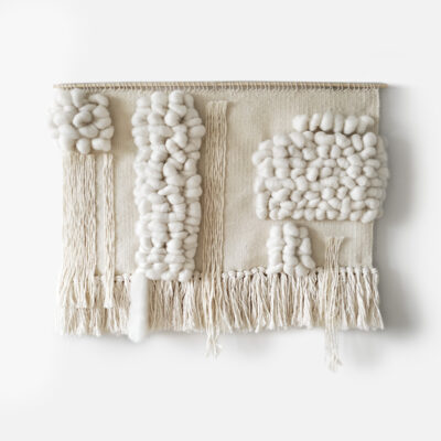Horizontal beige woven wall hanging made of wool, cotton and sizal