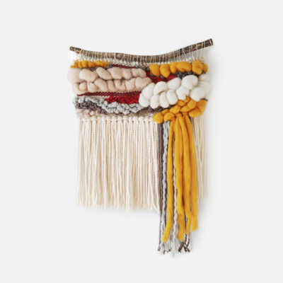 Small colorful boho woven tapestry with long beige fringes