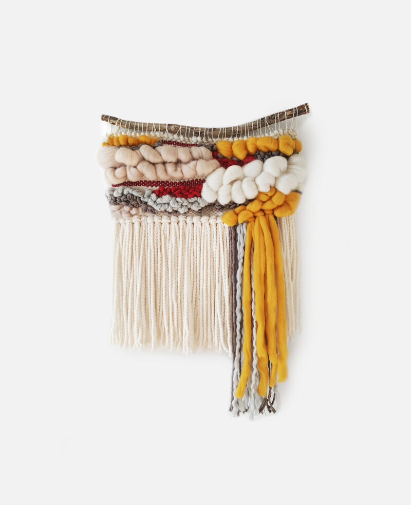 Small colorful boho woven tapestry with long beige fringes
