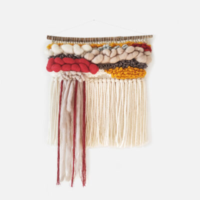 Small colorful boho woven wall hanging with long beige fringes