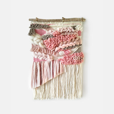 Beige and light pink boho woven wall hanging